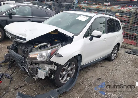 2017 Subaru Forester 2.5I Touring z USA, uszkodzony, nr VIN JF2SJAWC2HH440913